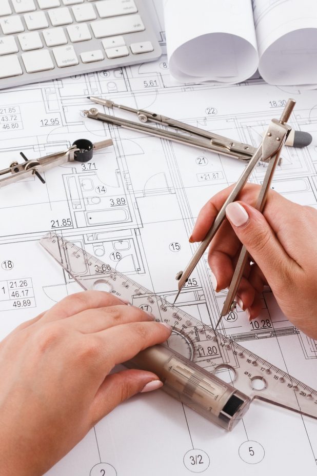 Architect drawing architectural project